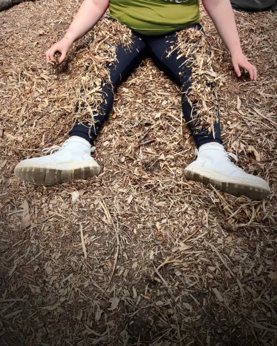 Staff member and child working calmly together at Maypole Farm